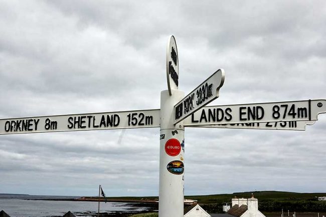 View of the sign post at John o’Groats to Lands End John o'Groats sign post in the north of Scotland accessible in a campervan from Zoom