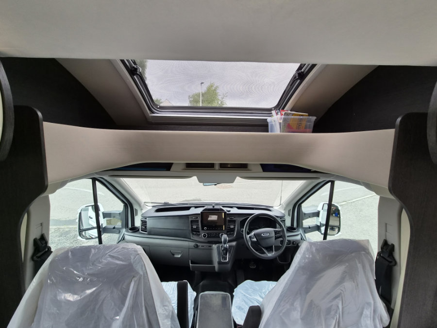 Zefiro 696 overhead cab storage
